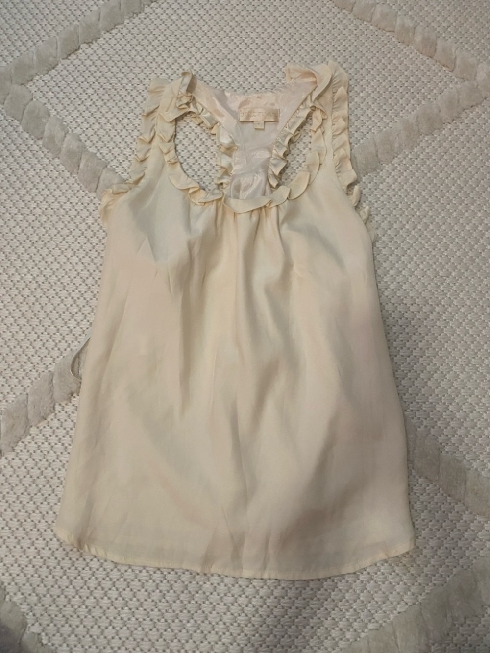 Cream Ruffle-Trim Sleeveless Blouse